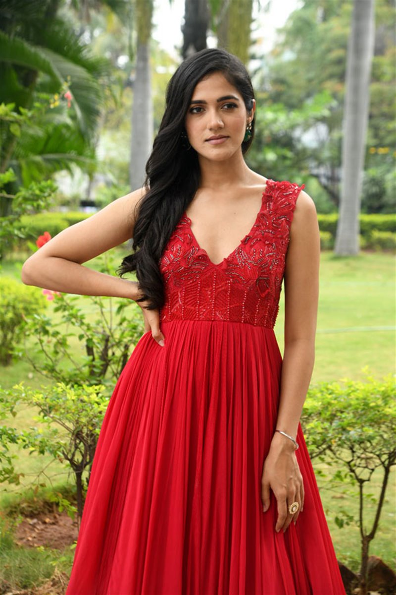 Telugu Actress Simran Choudhary in Red Dress at Atharva Movie Press Meet